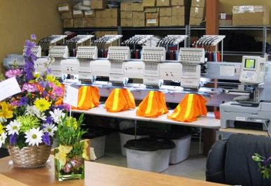 Embroidery machines with safety vests